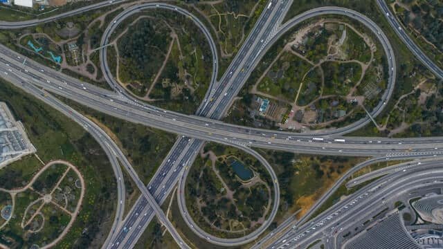 Aerial view of complex highway interchange.