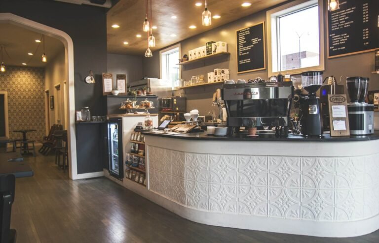 Cozy cafe interior with espresso machine and menu.